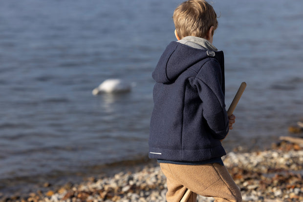 OUTDOORJACKE AUS BIOGEKOCHTER MERINOWOLLE - oliv