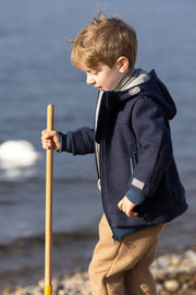 OUTDOORJACKE AUS BIOGEKOCHTER MERINOWOLLE - oliv